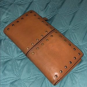 Michael Kors wallet, brown, with gold studs.